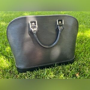 Louis Vuitton Epi Alma Hand Bag Black with Silver Hardware.